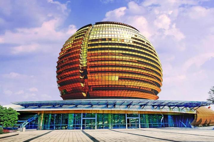 杭州70个经典建筑95杭州国际会议中心钱塘江边冉冉升起的大金球